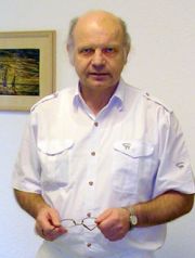 Dr. med. Karl Minas